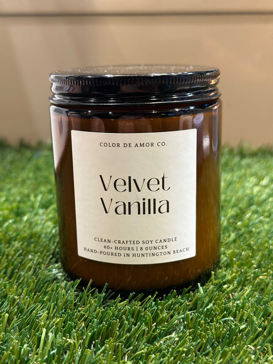 Amber glass jar with black lid candle container